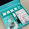 Designer Gift Set Leather Box with Lock Mahjong Gift Set 144 Mahjong Tiles Four-color Chips Plated Dice and Scoring Sticks Set Festival Gift