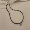 Colliers pendentifs Ping An Lock Chaîne en os faite à la main avec un design de perles rétro Sentiment d'un collier en petit groupe avec un nouveau style chinois Style chinoisL231215