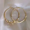 Boucles d'oreilles de créateur Sier Gold, grandes boucles d'oreilles légères pour femmes, avec un Design de Niche qui dégage un sentiment de tempérament et de tempérament