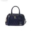 24SS Designer Miui Miui Sac Miumius Nouveau Miao Boston Sac À la mode et polyvalent plié Netizens Même sac à bandoulière portable Sac à bandoulière pour femme