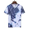 Moda para hombre Mujeres Diseñadores Tees Ropa Tops Hombre S Camisetas Casual Pecho Letra Graffiti Impresión Camisa Ropa Calle Pantalones cortos Manga Ropa Camisetas Polos M-3XL