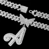 Naszyjniki wiszące mężczyzn Kobiety 14 mm kubański łańcuch kryształowy motyl inicjały Nazwa Naszyjka lodowane kursywne litery raper biżuteria 231214