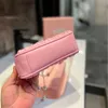 24SSデザイナーMIUI MIUIバッグMIUMIUSホームプリーツバッグ女性マイノリティデザインパールチェーン