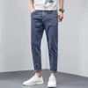 Mäns jeans Korea Casual byxor Ankellängd Högkvalitativ sommarsträcka bomullshål Thin Streetwear Design Denim 231214