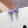 Boucles d'oreilles à tige de célébrité d'Internet avec améthyste naturelle incrustée dans les mêmes boucles d'oreilles. Tempérament et personnalité des femmes