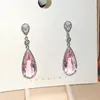 Boucles d'oreilles pendantes rose CZ pour femmes, couleur argent de luxe, accessoires féminins élégants, bijoux de déclaration de fête de danse, vente en gros