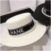 Breite Krempe Hüte Top Designer St Hat Markenbrief Damen Frühling und Sommer Vielseitige Perle Flache Japan Große Sonnenschutz Strandshows S Dh0UB