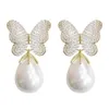 Sinzry Wspaniały symulowany perłowy sześcien cyrkon motyl kwiatowy biżuteria