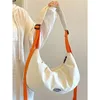 Bolsas de noche Bolsa de lona para estudiantes femeninos Libro 2023 Moda Coreana Casual Crossbody Tote Gran capacidad Dumpling