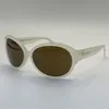 Kvinnor solglasögon mode modemärke triumfal båge män kvinnor acetat fiber båge vit ram modern mode elegant kattögon solglasögon med box cl40271