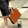 Briefcases Luxury Soft Leather Men s Briefcase Retro Large Capacity Handbag Tote Bag Male Shoulder Messenger Business Laptop 231216