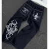 Haruku hiphop skalle broderi rosa rippade baggy jeans kvinnor nya mode casual gotiska breda byxor streetwear