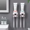 Set di accessori per il bagno Porta spazzolino Dispenser per dentifricio Supporto per montaggio a parete Accessori per il bagno Spremiagrumi automatico con rotazione