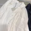 Kvinnokläder Nya kvinnor Silk Satin Shirts Smooth Glossy Bluses Top loe broderad fickdesign Skjorta High End Women's Long Sleeved Loose White Shirt