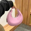 Toni Mini Half Moon Bags 가죽 여성 겨드랑이 핸드백 디자이너 지갑 구부러진 실루엣 3 차원 효과 토트 하드웨어 언더 암 숄더백