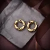 Frauen Ohrringe gebogen Gold glänzend Metall geometrische Ohrringe Designer Buchstaben Kette große Schleife Ohrringe Damen Vintage alte Messing Ohrstecker