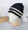 Cappello lavorato a maglia con strisce intrecciate retrò ispessimento invernale Protezione per le orecchie e protezione dal vento Cappello di lana caldo Marea