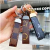 Chaveiros Lanyards Designer de Moda Chaveiro Clássico Requintado Luxo Carro Chaveiro Liga de Zinco Letra Uni Lanyard Metal Pequena Jóias Dr Dh31X