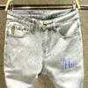 Herr- och kvinnors lila jeansdesigner Jeans Loose Diamond Print Casual Tracksuit Pants Ripped High Street Brand Patch Hole denim Straight Fashion Street Pants