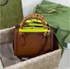 أعلى مقبض Marmont Diana Bamboo Bag Luxurys Luxurys Handbag Presh Leather أصلي حقيبة حمل مع أشرطة الكتف رجال Weekender Lady Clutch Crossbody Designer Pags