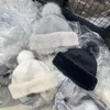 Berretti a filo palla ispessita caldo cappello carino protezione per le orecchie berretti invernali lavorati a maglia di lana sopra la testa imitazione di alta qualità