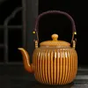 Bouteilles d'eau Théière en céramique chinoise exquise avec filtre 800 ml tasse pour bouilloire à thé Puer Pot ensemble théières tasse Service argile 231216