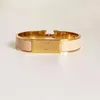 Högkvalitativ designer Design Bangle rostfritt stål Guldspännearmband Fashion Smycken Män och kvinnor armband 0001285p