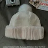 Berretti a filo palla ispessita caldo cappello carino protezione per le orecchie berretti invernali lavorati a maglia di lana sopra la testa imitazione di alta qualità