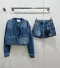 Märke två bitsklänning designer denim kvinnor sport 2 stycken set en breasted långärmad o-hals jacka triangel shorts kostym 2023 kläder casual tracksuit