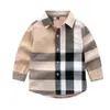 シャツ子供用シャツ男の子の子供服格子縞のラペル男性女性春と秋の長い綿のシャツ197f