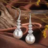 Boucles d'oreilles pendantes élégantes, couleur argent, Imitation de perles, goutte d'eau pour femmes, mode, Zircon scintillant, bijoux de fête de mariage, cadeaux fantaisie