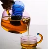 Botellas de agua Color de contraste creativo Vidrio resistente a altas temperaturas Filtro de separación de té Tetera pequeña Juego de tazas Tetera para el hogar 231218