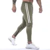 Herrbyxor män avslappnad jogging pocket sportbyxor gym sweatpants snabb torr fitness löpande joggar man kläder streetwear