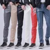 Pantalons pour hommes TSINGYI Printemps Moto Skinny Droite Faux Cuir Hommes Blanc Rouge Slim Fit Mince PU Pantalon Marque Vêtements 231218