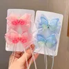 ヘアアクセサリー2pcs/set alloy butterflyクリップかわいい弓布ガールヘアピンハンフ飾りタッセルスタイリングツールヘッドドレス