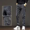 Heren jeans elastische taille denim broek hoge passende kleine voet mode slanke fit heren street straight broek