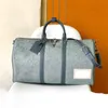 Borsa Toto di alta qualità 24k Borsa a tracolla stampata Borsa da viaggio in denim sbiadito da uomo Borsa a tracolla in pelle di lusso con manico superiore Borsa shopping Keepalles