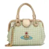Vivians Evening Bag Empress Dowager Xi's Niche Handbag pour femmes le nouveau sac à bandoulière à carreaux portables de cette année.
