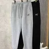 Pantaloni da uomo Pantaloni casual da uomo in cotone gelatinato ricamato versione alta con pantaloni sanitari stile marchio di uccelli e pantaloni sportivi alla caviglia per il calore e le donne dimagranti