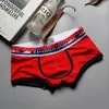 Mäns shorts Nya bomullsmän Slim Hip Boxer Briefs kommer med boxershorts och herrmode PersonalityL231218