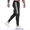 Herrbyxor män avslappnad jogging pocket sportbyxor gym sweatpants snabb torr fitness löpande joggar man kläder streetwear