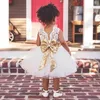 Robes de fille robe de fleur blanc tulle satin appliques avec grand noeud d'or petite fête d'anniversaire de mariage première communion vacances