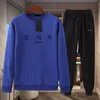 Mens Tracksuit 디자이너 트랙 슈트 땀복 가을 Mens 패션 트랙 슈트 조거 정장 재킷과 바지 세트 스포츠 정장 인쇄 여성 스포츠웨어 세트