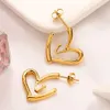 Kvinnors designer studörhängen hjärta örhänge guldpläterad rostfritt stål kärlek mode par smycken gåva bröllop fest tillbehör smycken julklappar