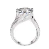 Stunning 5 Ct Pigeon Egg Moissanite Three-Stone Ring with Triple Rows of Simulated Diamond