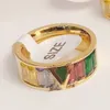 Modedesigner 18k guldpläterade band ringar lyxiga kvinnor märke bokstav rostfritt stål ring inlagd kristallälskare bröllop jul smycken tillbehör
