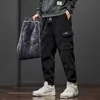 Pantaloni da uomo di marca Abbigliamento invernale in pile caldo velluto a coste da uomo Cargo da lavoro spesso largo streetwear pantaloni da jogging uomo di grandi dimensioni 5XL 231218