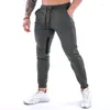 Pantaloni da uomo Pantaloni da jogging tascabili da palestra casual Pantaloni da tuta sportivi traspiranti Pantaloni da jogging ad asciugatura rapida Abbigliamento da corsa fitness