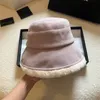 Designer Winter Thick Beanies With Bowknot Women Warm Knitted Cap Versatile Outwear Ear Protection Caps Brand Triumphal Arch Bucket Hats SDLX