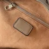 Borsa di design 2023 realizzata in pelle di vitello traforata, borsa con manico in pelle intrecciata di grande capacità, zaino a tracolla a tracolla 56073